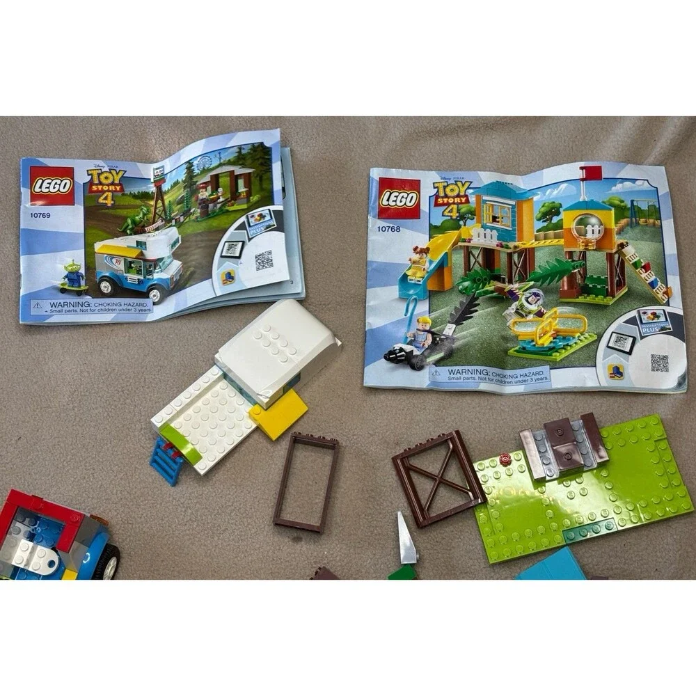 Lot of Disney Pixar LEGO Toy Story Sets 10769 and 10768 Incomplete with Manuals